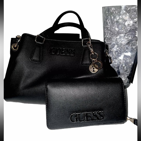 Guess Handbags - medium black and gold purse with wallet.
